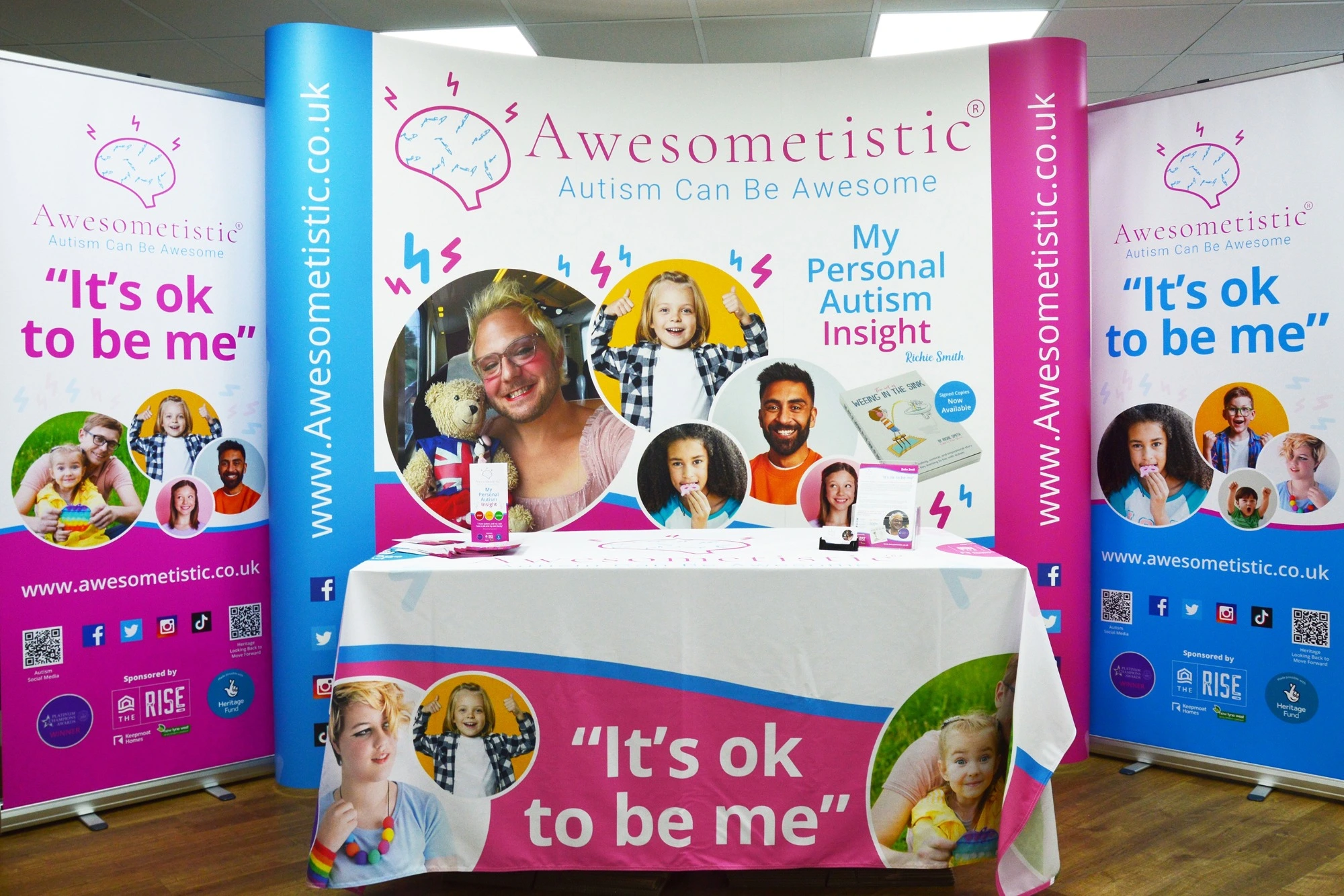 A large, colourful event stand for Awsometastic.