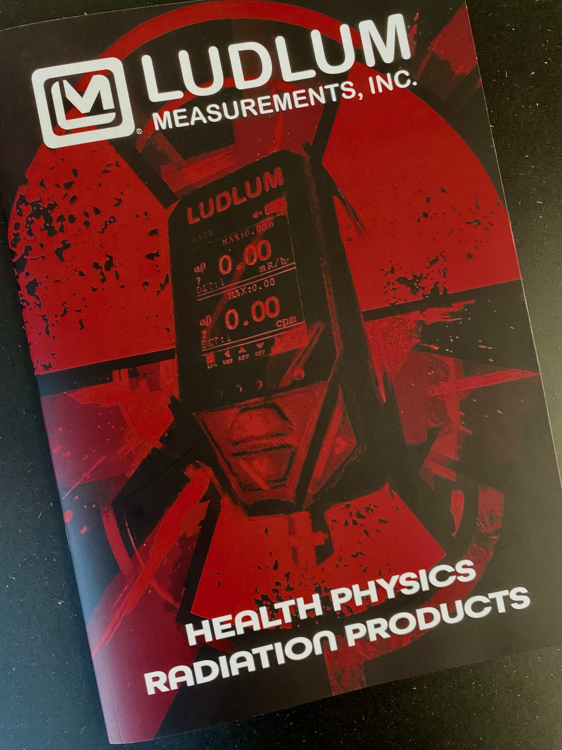 Red front cover of Ludlum Measurement Inc custom product catalogue brochure.